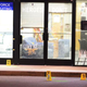 Evidence markers sit on the ground at the scene of a shooting in the parking lot of the Armed Forces Career Center and National Guard recruitment office July 16, 2015, in Chattanooga, Tenn.
Jason Davis/Getty Images